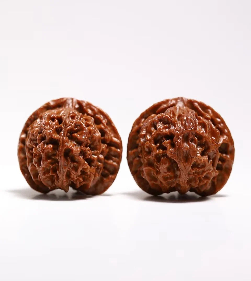 A wenwan walnut pair photographed against a light background.